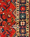 فرش دستباف آنتیک بختیاری طرح ترنجی ۳/۱۸ متری