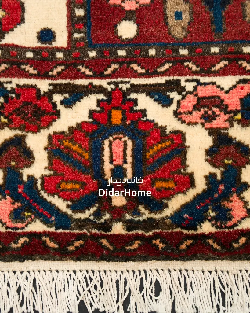 فرش دستباف آنتیک بختیاری طرح خشتی ۶/۹۹ متری