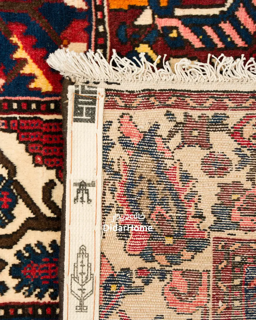 فرش دستباف آنتیک بختیاری طرح خشتی ۶/۹۹ متری