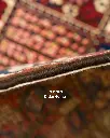 فرش دستباف آنتیک بختیاری طرح خشتی ۶/۹۹ متری